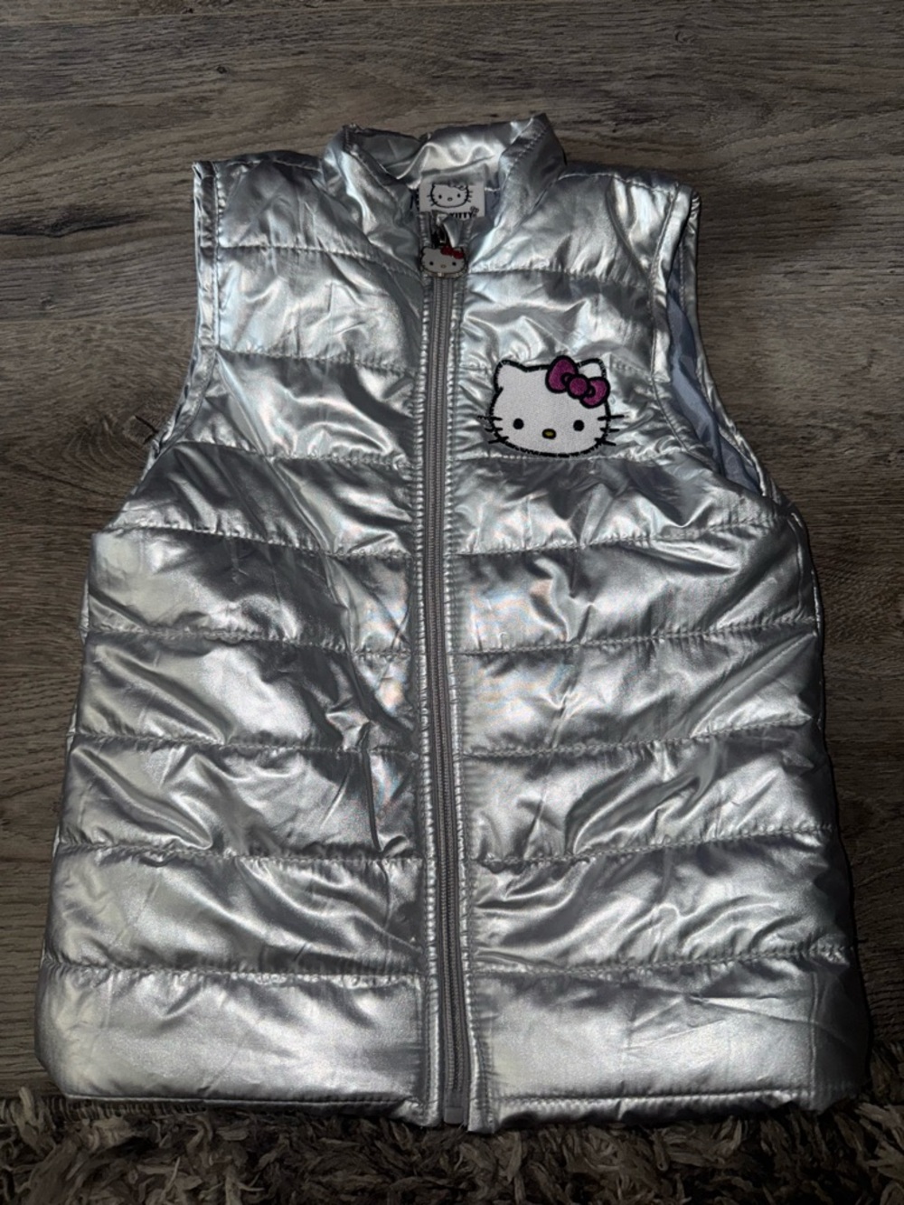 Hello Kitty chrome colored puffer vest 6X